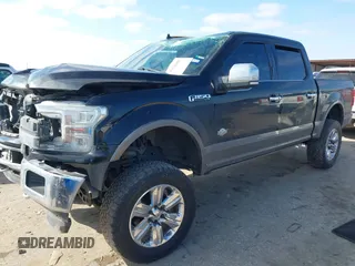 2018 Ford F-150 XL z VIN 1FTEW1EG9JFC27573, wystawiony jako IAAI lot #41626805 z przebiegiem 153 814 mil mil oraz . Historia ofert i sprzedaży dostępna na DreamBid. Obrazek 17.