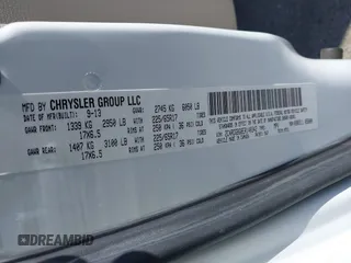 2014 Dodge Grand Caravan American Value with VIN 2C4RDGBG8ER140342, listed as a IAAI auction lot 42198306 with 135,564 mi miles and . Bid and sale history available at DreamBid. Image 9.