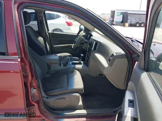 2009 Jeep Grand Cherokee Laredo with VIN 1J8GS48K39C521160, listed as a IAAI auction lot 42039577 with 262,829 mi miles. Bid and sale history available at carsss.com. Image 5.