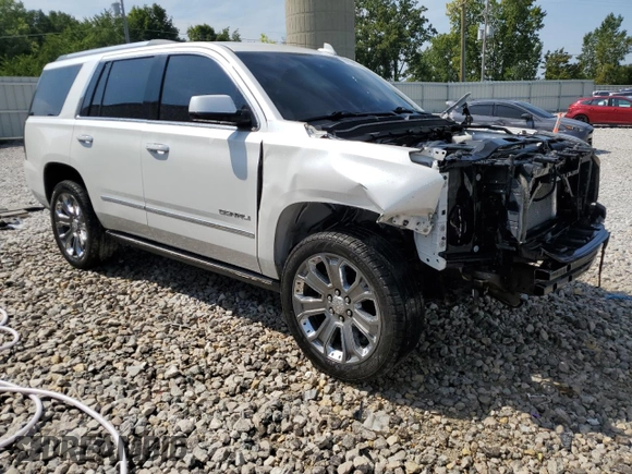 2016 GMC Yukon Denali with VIN 1GKS1CKJ3GR403865, listed as a Copart auction lot 68534264 with 129,655 mi miles and Salvage Title. Bid and sale history available at carsss.com. Image 4.