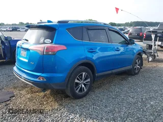 2018 Toyota RAV4 XLE with VIN JTMWFREV3JJ725847, listed as a IAAI auction lot 42110555 with 84,503 mi miles and . Bid and sale history available at DreamBid. Image 4.
