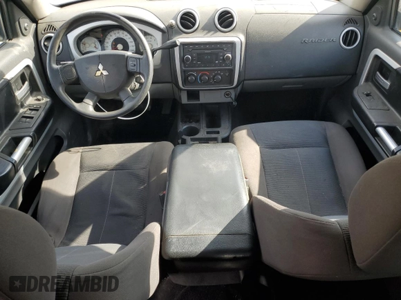 2008 Mitsubishi Raider LS z VIN 1Z7HC28K48S620012, wystawiony jako Copart lot #83677134 z przebiegiem 187 038 mil mil oraz Szkoda całkowita • Salvage title. Historia ofert i sprzedaży dostępna na DreamBid. Obrazek 8.