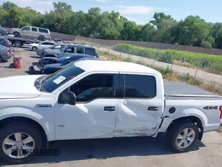 2015 Ford F-150 XLT with VIN 1FTEW1EP3FFC97920, listed as a IAAI auction lot 42619389 with 151,762 mi miles and . Bid and sale history available at DreamBid. Image 14.