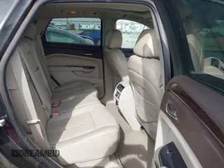 2013 Cadillac SRX Luxury Collection with VIN 3GYFNCE33DS617143, listed as a IAAI auction lot 41876084 with 102,512 mi miles. Bid and sale history available at carsss.com. Image 8.