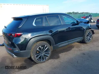 2023 Mazda CX-50 2.5 Turbo with VIN 7MMVABXY9PN154424, listed as a IAAI auction lot 40132755 with 10,620 mi miles. Bid and sale history available at carsss.com. Image 4.
