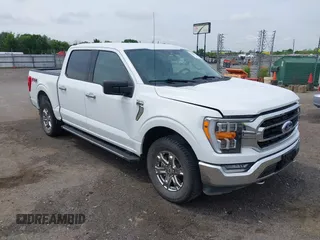 2021 Ford F-150 XL z VIN 1FTEW1EP2MFB40389, wystawiony jako IAAI lot #42093425 z przebiegiem 88 791 mil mil oraz . Historia ofert i sprzedaży dostępna na DreamBid. Obrazek 1.