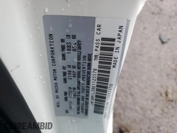 2014 Mazda 3 S Touring with VIN JM1BM1L38E1125578, listed as a Copart auction lot 86875654 with 142,759 mi miles and Salvage Title. Bid and sale history available at DreamBid. Image 14.