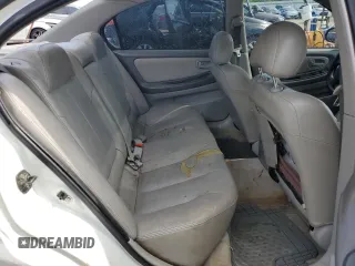 2001 Nissan Maxima GXE z VIN JN1CA31DX1T609659, wystawiony jako Copart lot #68002774 z przebiegiem 145 241 mil mil oraz Szkoda całkowita • Salvage title. Historia ofert i sprzedaży dostępna na DreamBid. Obrazek 10.