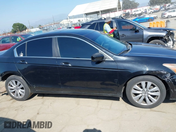 2011 Honda Accord EX z VIN 1HGCP2F70BA036181, wystawiony jako IAAI lot #41996641 z przebiegiem 214 601 mil mil oraz . Historia ofert i sprzedaży dostępna na DreamBid. Obrazek 14.