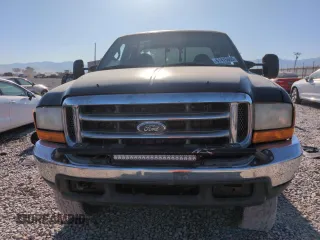1999 Ford F-250 XL with VIN 1FTNX21FXXEC98957, listed as a Copart auction lot 61476665 with 414,070 mi miles and Salvage title. Bid and sale history available at DreamBid. Image 5.