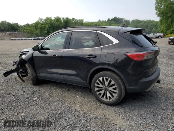 2020 Ford Escape Titanium с VIN 1FMCU9J97LUA20595, выставлен на аукционе Copart как лот 59476745 с пробегом 74 518 миль миль и Списание • Salvage title. История ставок и продаж доступна на DreamBid. Изображение 2.