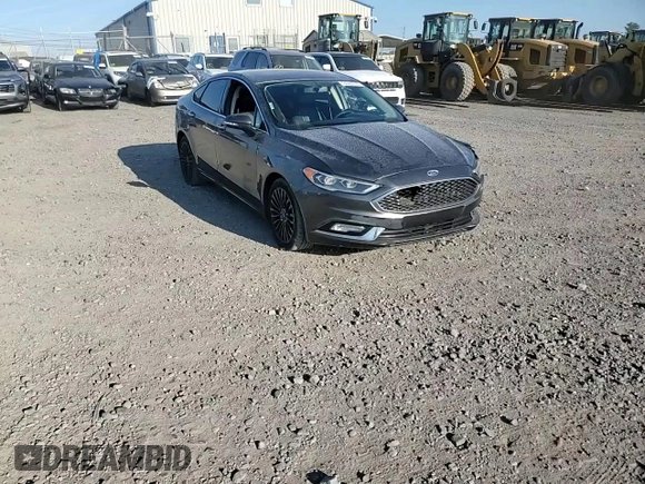 2018 Ford Fusion Titanium с VIN 3FA6P0D92JR192382, выставлен на аукционе Copart как лот 74065774 с пробегом 110 411 миль миль и Списание • Salvage title. История ставок и продаж доступна на DreamBid. Изображение 14.