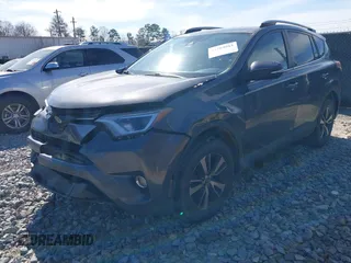 2018 Toyota RAV4 XLE with VIN 2T3WFREV2JW450019, listed as a IAAI auction lot 41704084 with 257,737 mi miles. Bid and sale history available at carsss.com. Image 17.