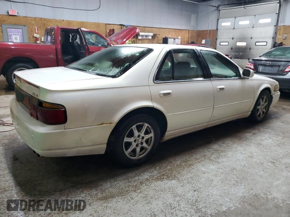 2004 Cadillac Seville Luxury SLS z VIN 1G6KS54Y24U168062, wystawiony jako Copart lot #84865574 z przebiegiem 240 052 mil mil oraz Tytuł czysty. Historia ofert i sprzedaży dostępna na DreamBid. Obrazek 3.