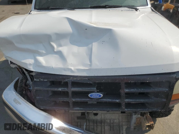 1992 Ford F-150 with VIN 1FTEF14HXNPA24587, listed as a Copart auction lot 70803324 with 0 mi miles and Salvage Title. Bid and sale history available at carsss.com. Image 11.