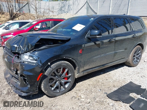 2023 Dodge Durango SRT Hellcat Premium with VIN 1C4SDJH91PC687665, listed as a IAAI auction lot 42070800 with 65,787 mi miles and . Bid and sale history available at DreamBid. Image 2.