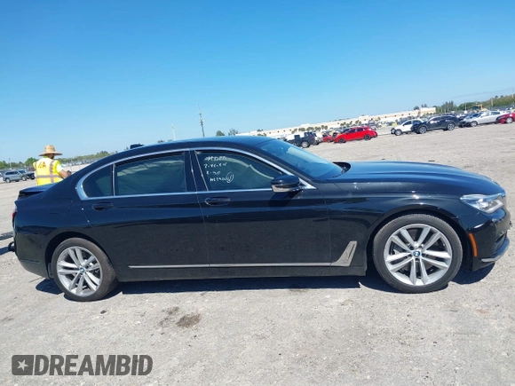 2018 BMW 7 Series 750i with VIN WBA7F0C54JGM22900, listed as a IAAI auction lot 41673673 with 66,264 mi miles. Bid and sale history available at carsss.com. Image 12.