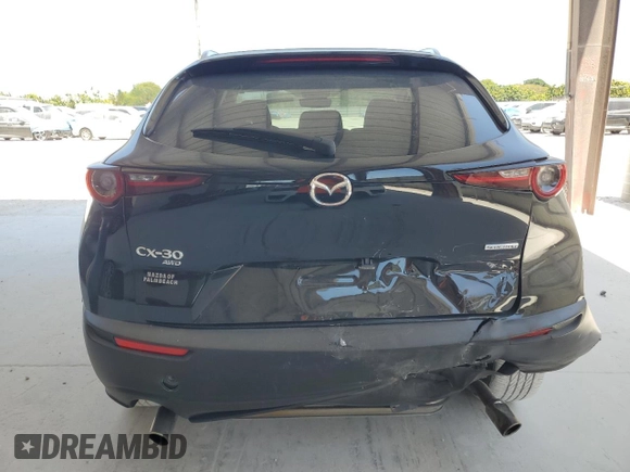 2024 Mazda CX-30 S Select Sport with VIN 3MVDMBBM8RM701752, listed as a Copart auction lot 54662705 with 16,720 mi miles and Salvage title. Bid and sale history available at DreamBid. Image 6.