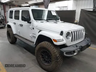 2021 Jeep Wrangler Unlimited Sahara z VIN 1C4JJXP68MW857402, wystawiony jako IAAI lot #42149574 z przebiegiem 27 239 mil mil oraz . Historia ofert i sprzedaży dostępna na DreamBid. Obrazek 1.