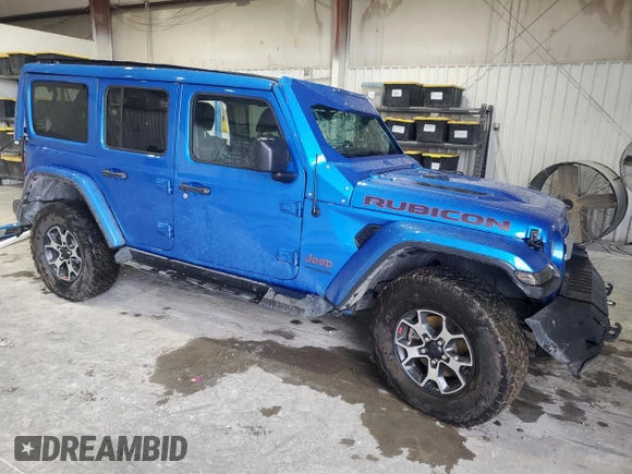 2021 Jeep Wrangler Unlimited Rubicon with VIN 1C4HJXFN6MW756530, listed as a Copart auction lot 51976395 with Not provided miles and Salvage title. Bid and sale history available at DreamBid. Image 4.