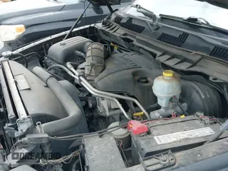 2011 Ram 1500 Big Horn z VIN 1D7RB1GT3BS657413, wystawiony jako IAAI lot #42208287 z przebiegiem 197 557 mil mil oraz . Historia ofert i sprzedaży dostępna na DreamBid. Obrazek 21.