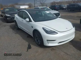 2023 Tesla Model 3 z VIN 5YJ3E1EA8PF610682, wystawiony jako IAAI lot #41725011 z przebiegiem 19 554 mil mil oraz . Historia ofert i sprzedaży dostępna na DreamBid. Obrazek 1.