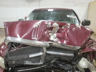 2002 Dodge 1500 z VIN 1D7HA16N52J164582, wystawiony jako Copart lot #88291545 z przebiegiem 157 414 mil mil oraz Czysty tytuł • Clean title. Historia ofert i sprzedaży dostępna na DreamBid. Obrazek 11.