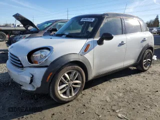 2012 MINI Countryman with VIN WMWZB3C51CWM03820, listed as a Copart auction lot 89409725 with 119,703 mi miles and Salvage Title. Bid and sale history available at DreamBid. Image 1.