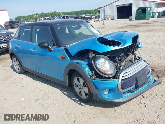 2015 MINI Hardtop 4 Door with VIN WMWXS5C56FT831505, listed as a IAAI auction lot 42155398 with 95,693 mi miles and . Bid and sale history available at DreamBid. Image 1.