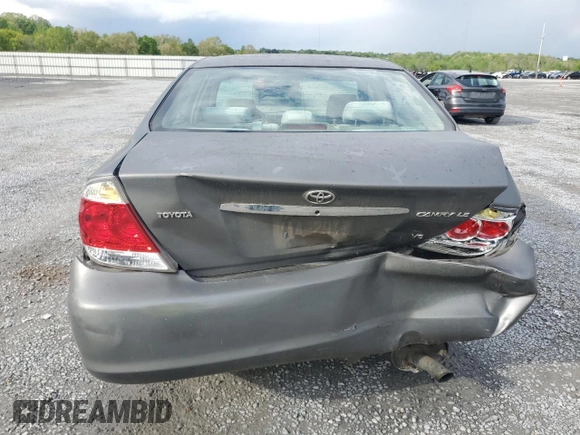 2005 Toyota Camry LE with VIN 4T1BF32K45U599214, listed as a Copart auction lot 52609295 with 304,316 mi miles and Salvage Title. Bid and sale history available at DreamBid. Image 6.