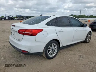 2016 Ford Focus SE with VIN 1FADP3F23GL336750, listed as a Copart auction lot 57972795 with 113,990 mi miles and Salvage title. Bid and sale history available at DreamBid. Image 3.