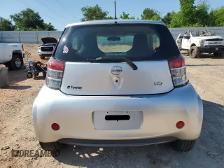 2012 Scion iQ with VIN JTNJJXB05CJ010539, listed as a Copart auction lot 56489245 with 114,623 mi miles and Salvage title. Bid and sale history available at DreamBid. Image 6.