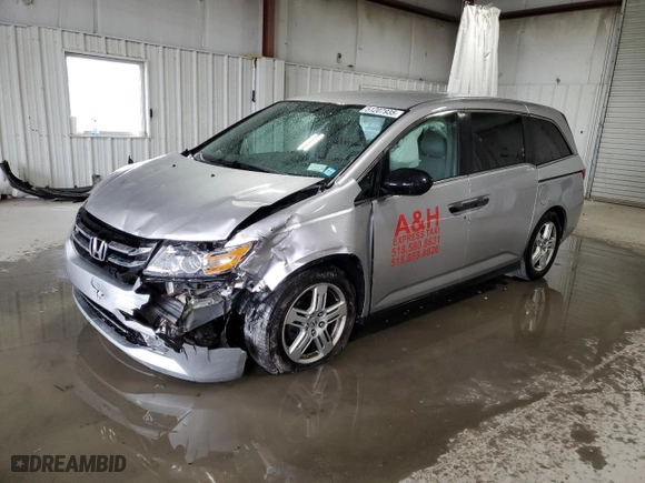 2015 Honda Odyssey LX with VIN 5FNRL5H27FB106960, listed as a Copart auction lot 51207935 with 144,668 mi miles and Salvage Title. Bid and sale history available at carsss.com. Image 1.