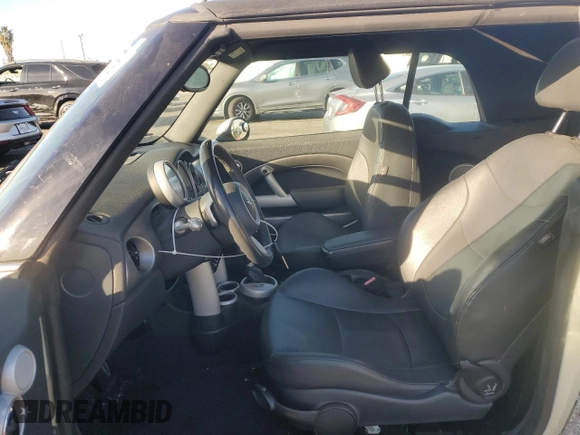 2007 MINI Convertible S with VIN WMWRH33567TL94957, listed as a Copart auction lot 42127775 with 90,401 mi miles and Salvage title. Bid and sale history available at DreamBid. Image 7.