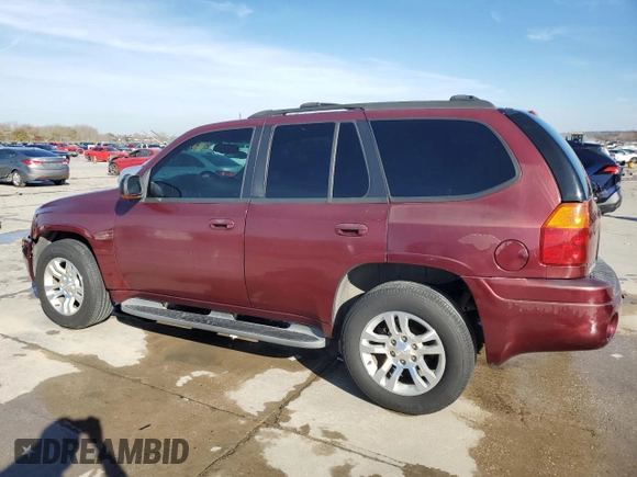 2003 GMC Envoy SLT with VIN 1GKDT13S732378731, listed as a Copart auction lot 88340825 with 125,814 mi miles and Salvage Title. Bid and sale history available at carsss.com. Image 2.