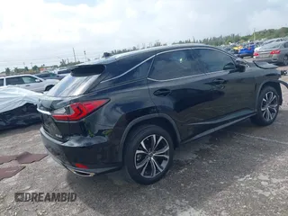 2020 Lexus RX 350 with VIN 2T2HZMAA9LC153571, listed as a IAAI auction lot 41710981 with 34,354 mi miles and . Bid and sale history available at DreamBid. Image 4.