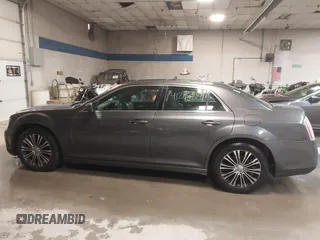2014 Chrysler 300 with VIN 2C3CCAGG0EH179435, listed as a IAAI auction lot 41202319 with 149,410 mi miles. Bid and sale history available at carsss.com. Image 14.