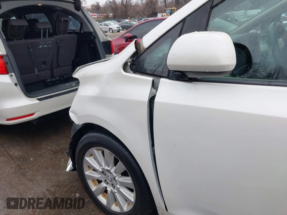 2015 Toyota Sienna Ltd with VIN 5TDDK3DC9FS115784, listed as a IAAI auction lot 41355934 with 125,675 mi miles. Bid and sale history available at carsss.com. Image 17.