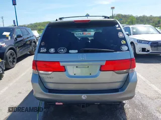 2010 Honda Odyssey EX with VIN 5FNRL3H44AB059711, listed as a IAAI auction lot 42057760 with 225,486 mi miles and . Bid and sale history available at DreamBid. Image 16.