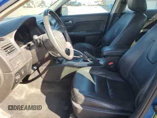 2012 Ford Fusion SEL with VIN 3FAHP0JA2CR221728, listed as a Copart auction lot 53640955 with 133,728 mi miles and Salvage Title. Bid and sale history available at DreamBid. Image 7.