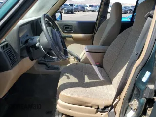 2001 Jeep Cherokee Sport with VIN 1J4FF48S91L610463, listed as a Copart auction lot 59601495 with Not provided miles and Salvage title. Bid and sale history available at DreamBid. Image 7.