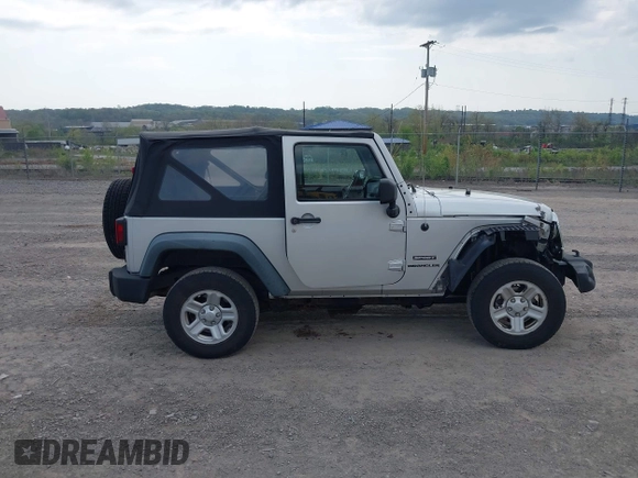 2011 Jeep Wrangler Sport with VIN 1J4AA2D18BL546069, listed as a IAAI auction lot 42139693 with 56,395 mi miles and . Bid and sale history available at carsss.com. Image 14.