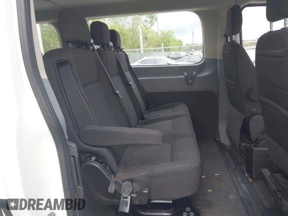 2018 Ford Transit Passenger XL with VIN 1FBZX2ZM0JKA10221, listed as a IAAI auction lot 41988879 with 54,340 mi miles and . Bid and sale history available at DreamBid. Image 8.