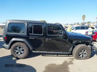 2023 Jeep Wrangler Willys with VIN 1C4HJXDN0PW597768, listed as a IAAI auction lot 41645815 with 23,717 mi miles and . Bid and sale history available at DreamBid. Image 14.