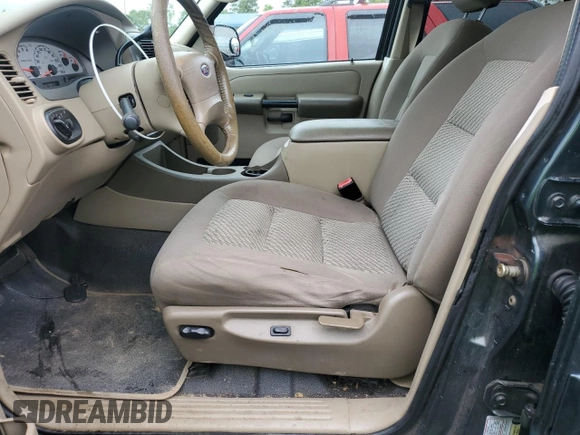2004 Ford Explorer Sport Trac XLS with VIN 1FMZU67K04UA70503, listed as a Copart auction lot 58214785 with 195,688 mi miles and Salvage title. Bid and sale history available at DreamBid. Image 7.