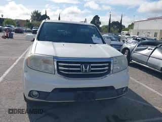 2015 Honda Pilot Touring with VIN 5FNYF3H93FB007766, listed as a IAAI auction lot 41932052 with 131,036 mi miles. Bid and sale history available at carsss.com. Image 12.