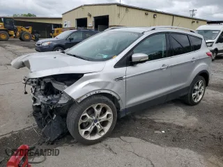 2015 Ford Escape Titanium z VIN 1FMCU9J99FUA02166, wystawiony jako Copart lot #58898295 z przebiegiem 147 344 mil mil oraz Szkoda całkowita • Salvage title. Historia ofert i sprzedaży dostępna na DreamBid. Obrazek 1.