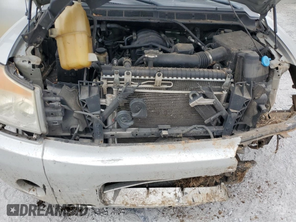 2008 Nissan Titan XE z VIN 1N6BA06A58N300022, wystawiony jako Copart lot #78104064 z przebiegiem 169 473 mil mil oraz Szkoda całkowita • Salvage title. Historia ofert i sprzedaży dostępna na DreamBid. Obrazek 11.