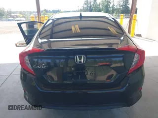 2016 Honda Civic EX-L z VIN 2HGFC1F76GH650308, wystawiony jako IAAI lot #42408661 z przebiegiem Nie podano mil oraz . Historia ofert i sprzedaży dostępna na DreamBid. Obrazek 16.