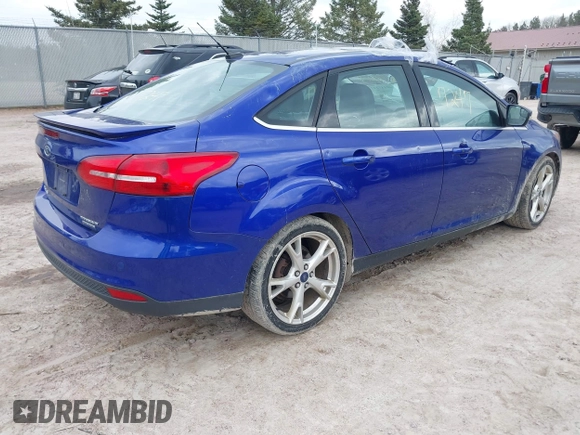 2015 Ford Focus Titanium with VIN 1FADP3J27FL298882, listed as a IAAI auction lot 42117247 with 124,185 mi miles and . Bid and sale history available at carsss.com. Image 4.